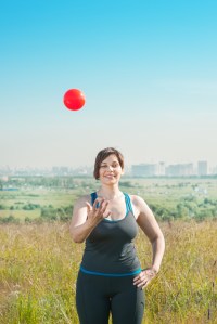 Woman exercising with ball